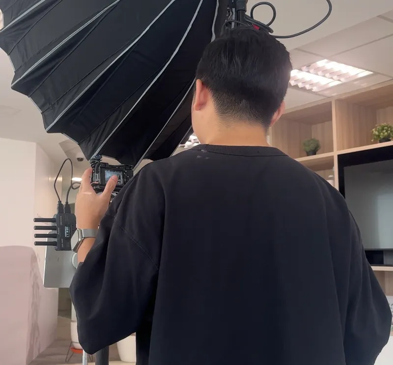 On set: Operating under the key light.