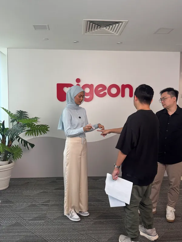 Pigeon (upcoming) · Director: Walking talent through the script before a take.